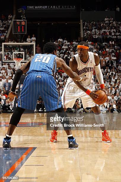 Stephen Jackson of the Charlotte Bobcats looks to make a move against Mickael Pietrus of the Orlando Magic in Game Three of the Eastern Conference...