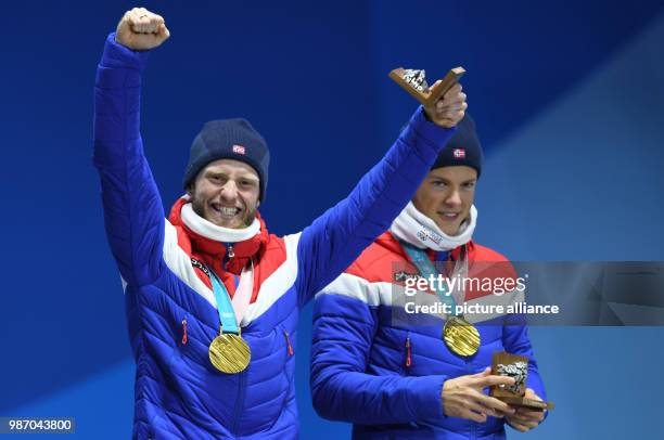 February 2018, South Korea, Pyeongchang, Olympics, Cross-country skiing, men's team sprint, award ceremony, Medal Plaza: Norway's Martin Johnsrud...