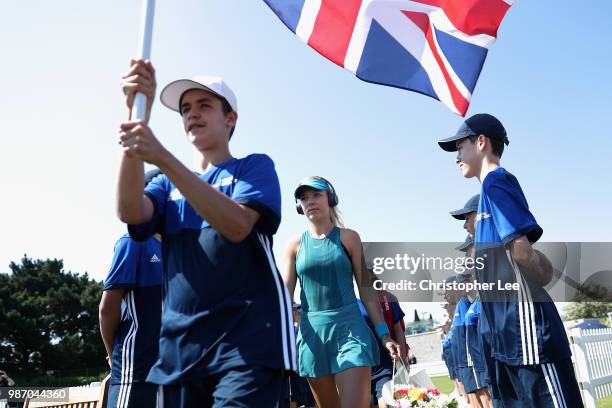 Katie Boulter of Great Britain enters the court for her match against Kirsten Flipkins of Belgium in the Womens Singles Final match during of the...