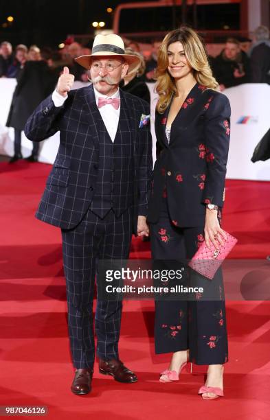 February 2018, Germany, Hamburg, Golden Camera Awards Ceremony: Moderator Horst Lichter and his wife Nada arrive on the red carpet. Photo: Christian...
