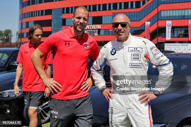 Alkmaar Players receive their new cars, Ron Vlaar of AZ Alkmaar, Tom Coronel during the AZ Alkmaar Players receive their new cars at the AFAS Stadium...