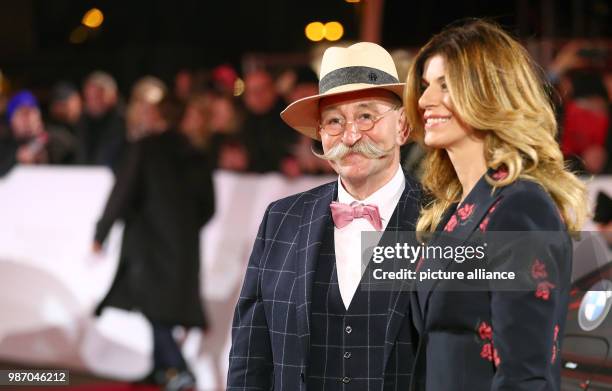 February 2018, Germany, Hamburg, Golden Camera Awards Ceremony: Moderator Horst Lichter and his wife Nada arrive on the red carpet. Photo: Christian...