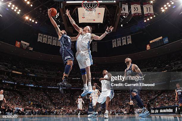 Deron Williams of the Utah Jazz goes up for a shot over Chris Andersen of the Denver Nuggets in Game One of the Western Conference Quarterfinals...