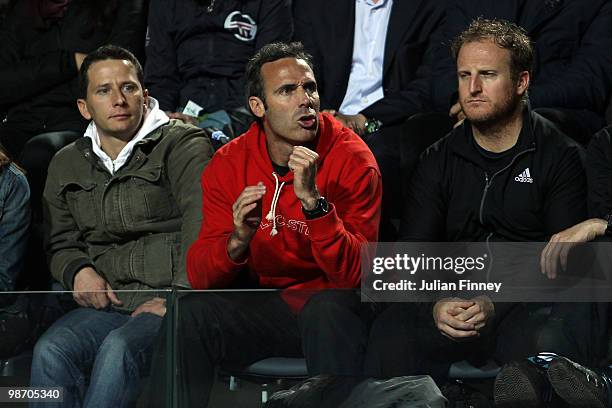 Alex Corretja, clay court coach of Andy Murray of Great Britain gives his support in his match against Andreas Seppi of Italy after the match during...