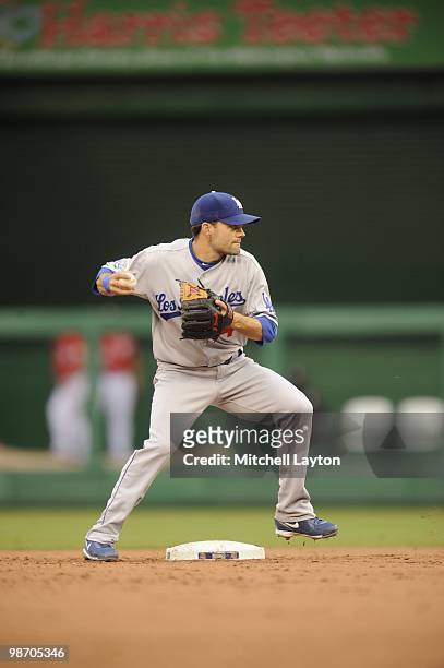 Jamie Carroll of the Los Angeles Dodgers fields a ground ball during a baseball game against the Washington Nationals on April 24, 2010 at Nationals...