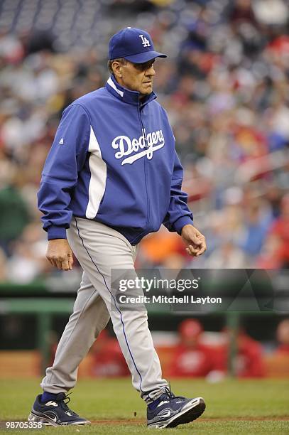 Joe Torre, manager of the Los Angeles Dodgers, walks back to the dugout during a baseball game against the Washington Nationals on April 24, 2010 at...