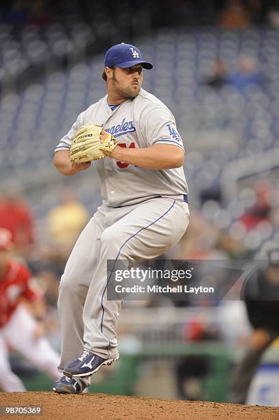 Jonathan Broxton of the Los Angeles Dodgers pitches during a baseball game against the Washington Nationals on April 24, 2010 at Nationals Park in...