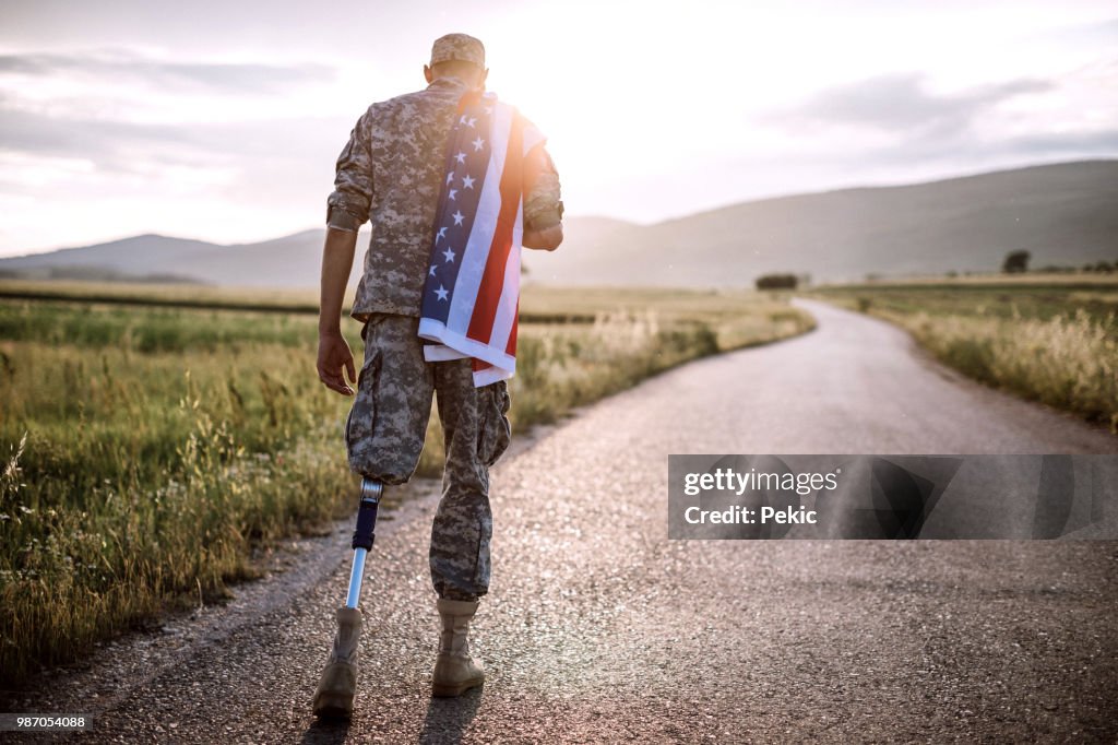 American Amputee Soldier On Road