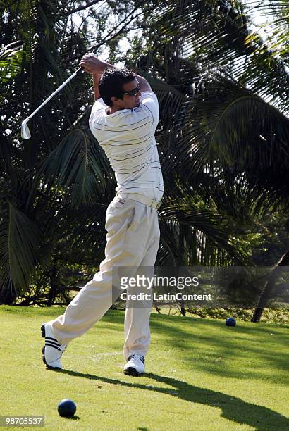 Winner of the 1st Montecristo Golf Cup Iorkis Cabrera plays a shot during the 2nd Montecristo Cup at the Varadero Golf Club on April 24, 2010 in...