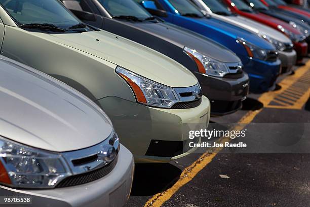 Ford vehicles are seen on the sales lot of Metro Ford on April 27, 2010 in Miami, Florida. Ford announced today that it earned $2.08 billion, or 50...