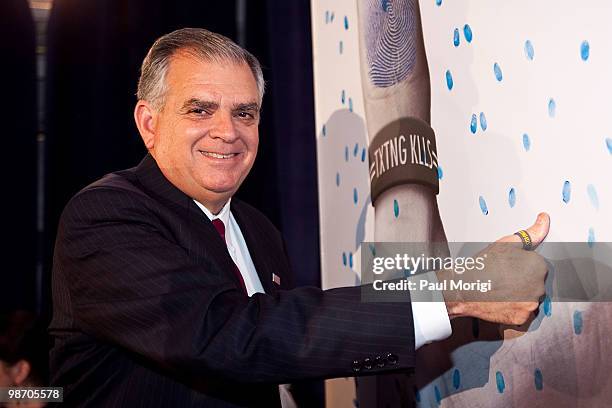 Secretary of Transportation Ray LaHood makes the "X the TXT" pledge at the Allstate 'X the TXT' press conference at Columbus Club in Union Station on...