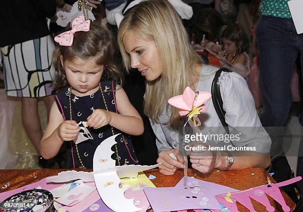 Media personality Elisabeth Hasselbeck and daughter Grace Hasselbeck create in the arts and crafts room during the 50th Anniversary Release of the...
