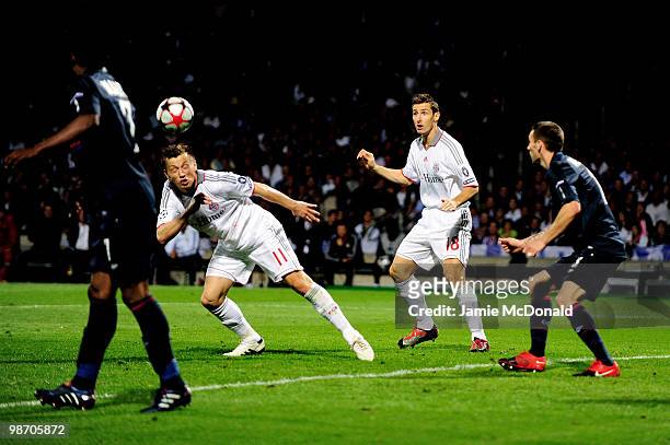 Ivica Olic of Bayern Muenchen scores his team's third goal during the UEFA Champions League semi final second leg match between Olympique Lyonnais...
