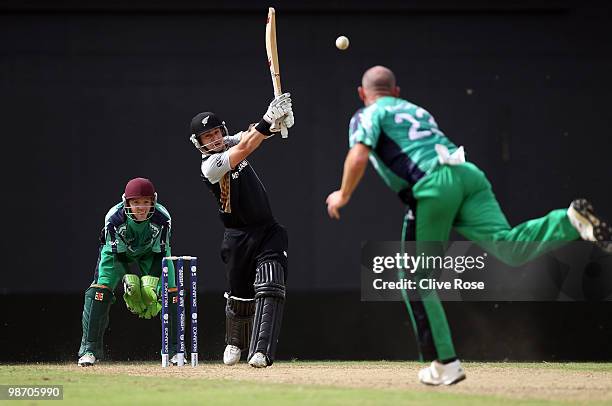 Nathan McCullum of New Zealand hits a six during The ICC T20 World Cup warm up match between Ireland and New Zealand at The Guyana National Stadium...