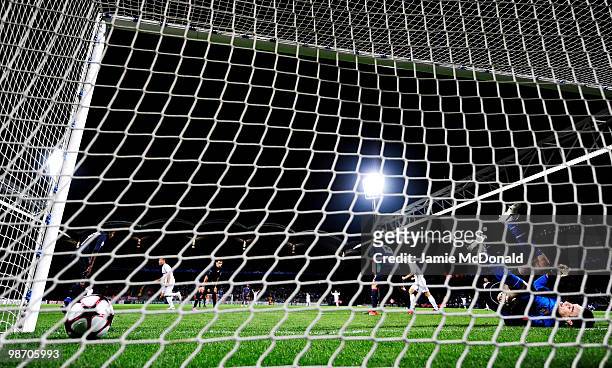 Goalkeeper Hugo Loris of Olympique Lyonnais lies on his back after conceding a third goal to Ivica Olic of Bayern Muenchen during the UEFA Champions...