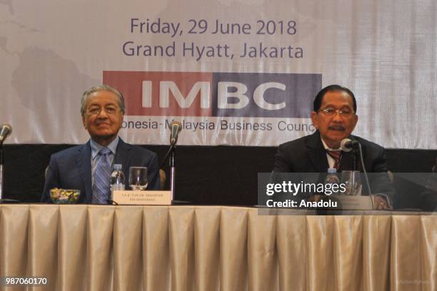 The Malaysian Prime Minister Mahathir Mohamad on a press conference with Indonesia-Malaysia Business Council Chairman Tanri Abeng at Grand Hyatt in...