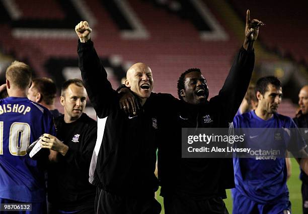 Lee Hughes and Ade Akinbiyi of Notts County celebrate after winning the Coca Cola League Two title after the Coca Cola League Two match between...