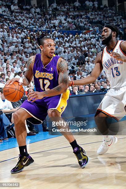 Shannon Brown of the Los Angeles Lakers moves away from James Harden of the Oklahoma City Thunder in Game Four of the Western Conference...