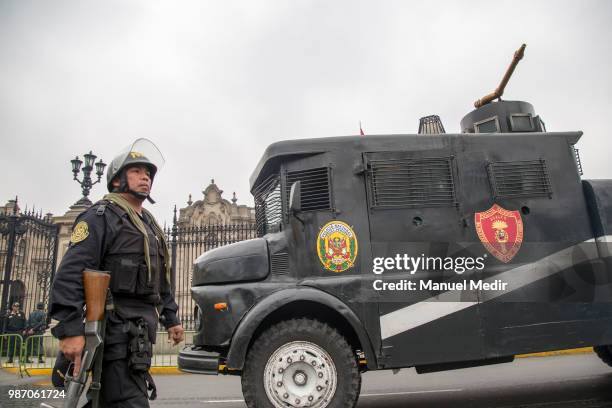 Riot police is seen during a protest against corruption in public institutions in front of Government Palace on June 27, 2018 in Lima, Peru.