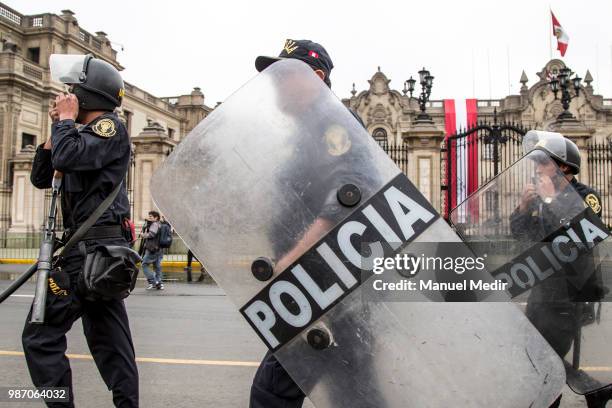 Riot police is seen during a protest against corruption in public institutions in front of Government Palace on June 27, 2018 in Lima, Peru.