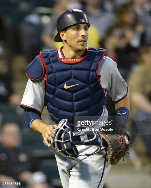 Jason Castro of the Minnesota Twins looks on against the Chicago White Sox on May 4, 2018 at Guaranteed Rate Field in Chicago, Illinois.