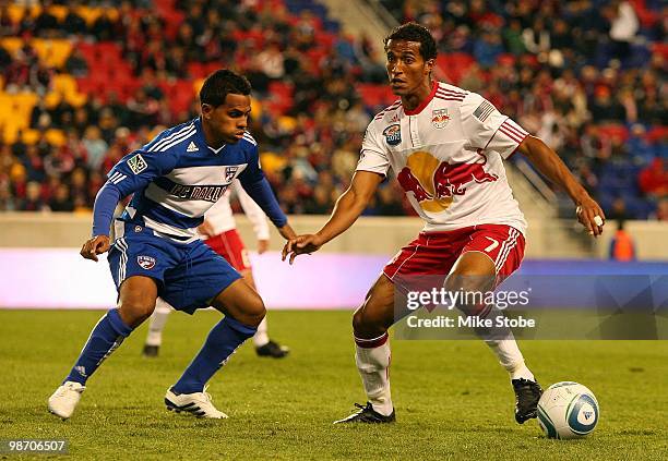 Roy Miller of the New York Red Bulls plays the ball against Daniel Hernandez of the FC Dallas on April 17, 2010 at Red Bull Arena in Harrison, New...