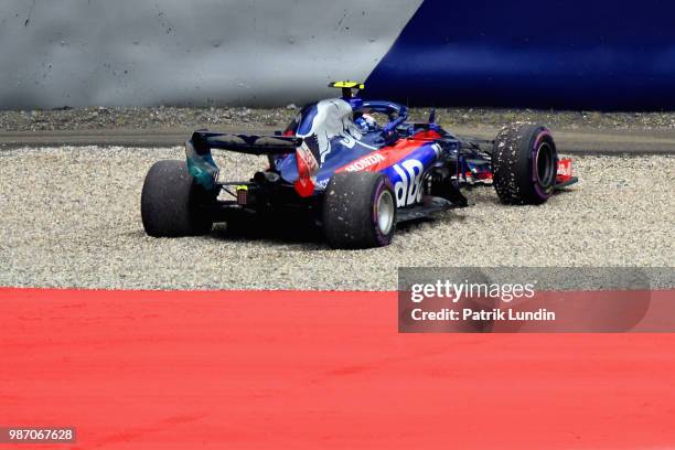 Pierre Gasly of France and Scuderia Toro Rosso driving the Scuderia Toro Rosso STR13 Honda stops on track during practice for the Formula One Grand...