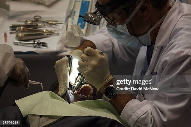 Dental care is performed at the Remote Area Medical clinic at the Los Angeles Sports Arena on April 27, 2010 in Los Angeles, California. More than...