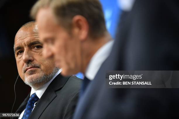Bulgaria's Prime Minister Boyko Borisov looks on as he gives a joint press conference with President of the European Commission and European Council...
