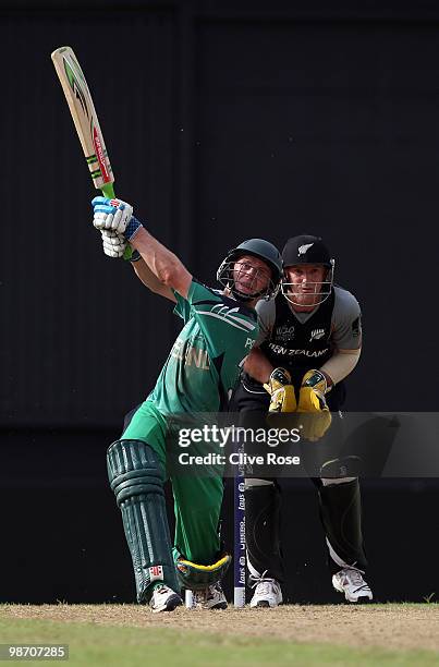 William Porterfield of Ireland hits a six during The ICC T20 World Cup warm up match between Ireland and New Zealand at The Guyana National Stadium...