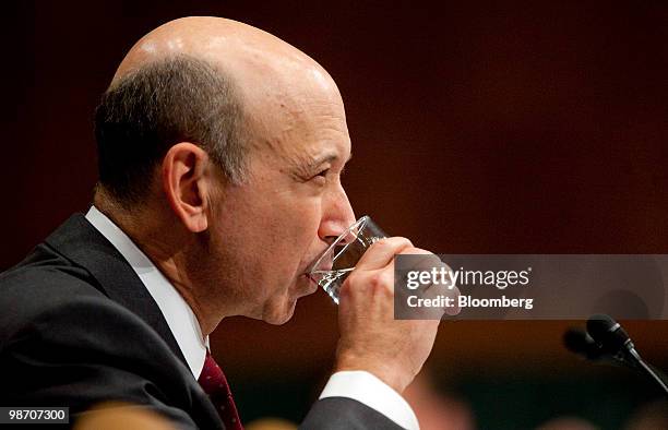 Lloyd C. Blankfein, chairman and chief executive officer of Goldman Sachs Group Inc., takes a drink of water during a Senate Homeland Security and...