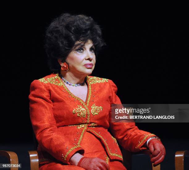 Italian actress Gina Lollobrigida poses during a ceremony in hommage to French legend actor Gerard Philipe to commemorate the 50th birthday of his...