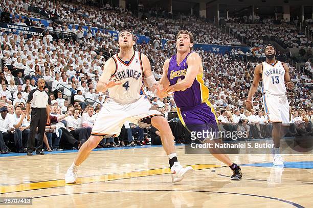 Nick Collison of the Oklahoma City Thunder and Luke Walton of the Los Angeles Lakers battle for position in Game Four of the Western Conference...