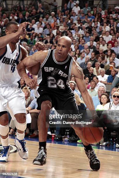 Richard Jefferson of the San Antonio Spurs drives to the basket against Caron Butler of the Dallas Mavericks in Game Two of the Western Conference...