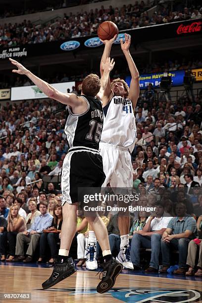 Dirk Nowitzki of the Dallas Mavericks shoots a jump shot against Matt Bonner of the San Antonio Spurs in Game Two of the Western Conference...