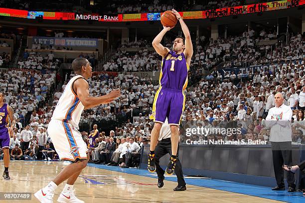 Jordan Farmar of the Los Angeles Lakers shoots over Kevin Ollie of the Oklahoma City Thunder in Game Four of the Western Conference Quarterfinals...