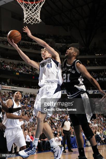 Dirk Nowitzki of the Dallas Mavericks shoots a layup against Tim Duncan of the San Antonio Spurs in Game Two of the Western Conference Quarterfinals...