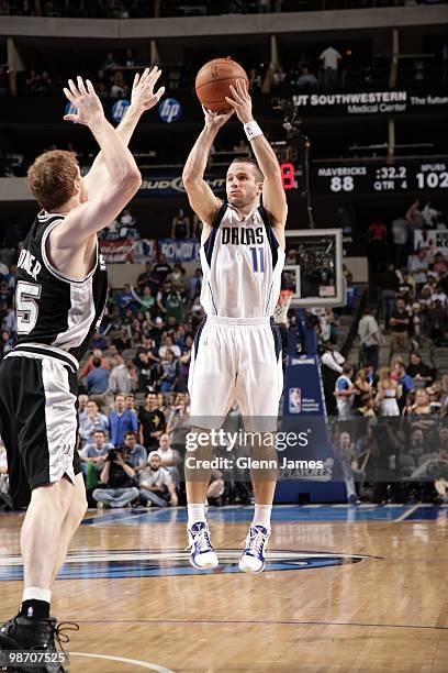 Jose Barea of the Dallas Mavericks shoots a jump shot against Matt Bonner of the San Antonio Spurs in Game Two of the Western Conference...