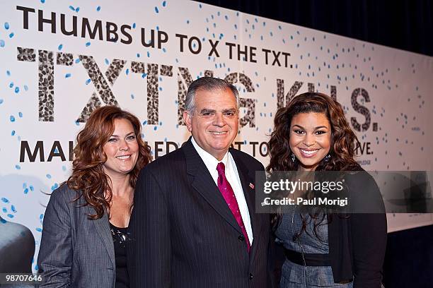 Jodi Sparks, Secretary of Transportation Ray LaHood and American Idol-winner Jordin Sparks pose for a photo at the Allstate 'X the TXT' press...