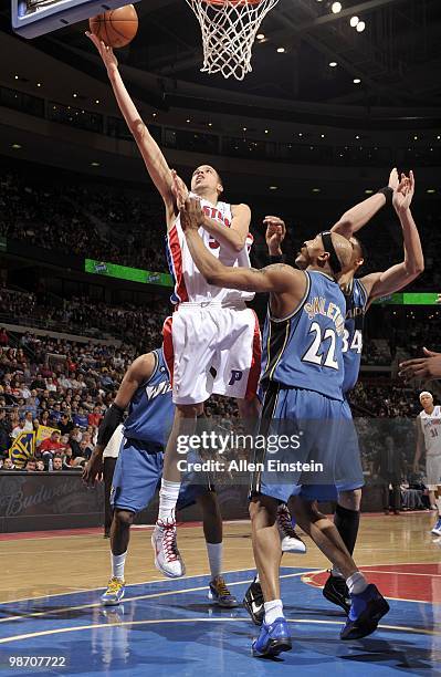 Austin Daye of the Detroit Pistons lays the ball past James Singleton of the Washington Wizards on March 12, 2010 at The Palace of Auburn Hills in...