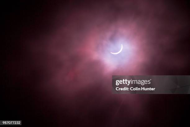 moon eclipsing sun - dry ice texture stock pictures, royalty-free photos & images