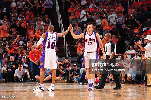 Louis Amundson of the Phoenix Suns celebrates with Leandro Barbosa against the Portland Trail Blazers in Game Two of the Western Conference...