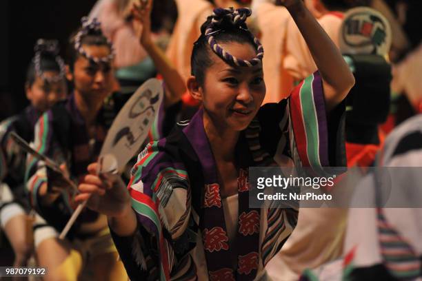 People perform Awa Dance in Tokushima City, Tokushima Prefecture in western Japan on Jun. 29, 2018.