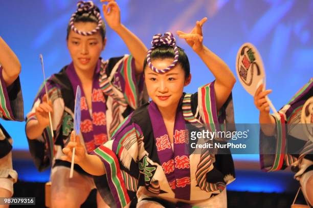 People perform Awa Dance in Tokushima City, Tokushima Prefecture in western Japan on Jun. 29, 2018.