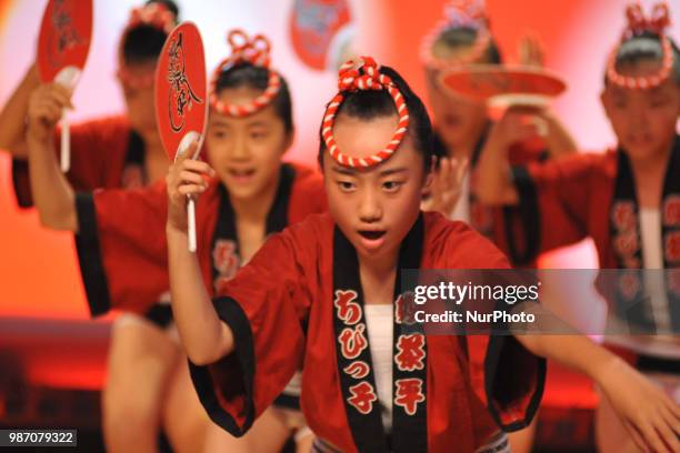 People perform Awa Dance in Tokushima City, Tokushima Prefecture in western Japan on Jun. 29, 2018.