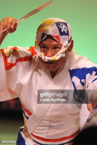 People perform Awa Dance in Tokushima City, Tokushima Prefecture in western Japan on Jun. 29, 2018.