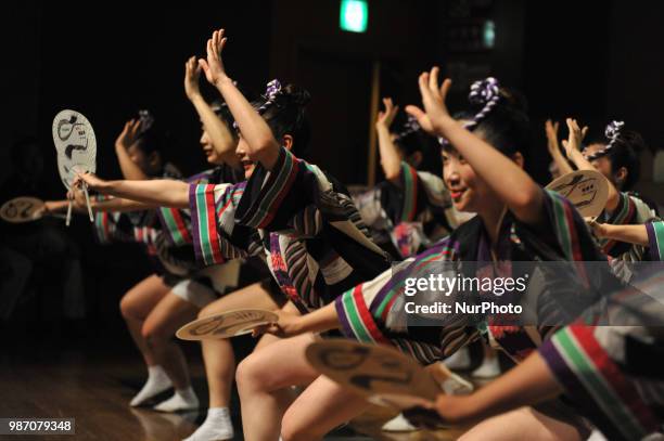 People perform Awa Dance in Tokushima City, Tokushima Prefecture in western Japan on Jun. 29, 2018.