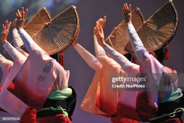 People perform Awa Dance in Tokushima City, Tokushima Prefecture in western Japan on Jun. 29, 2018.