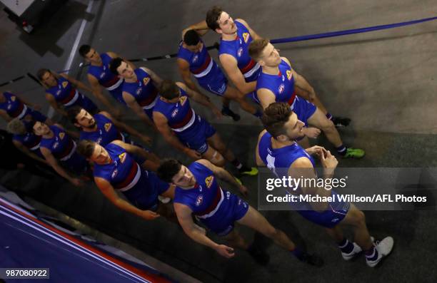 Marcus Bontempelli of the Bulldogs leads his team out during the 2018 AFL round15 match between the Western Bulldogs and the Geelong Cats at Etihad...