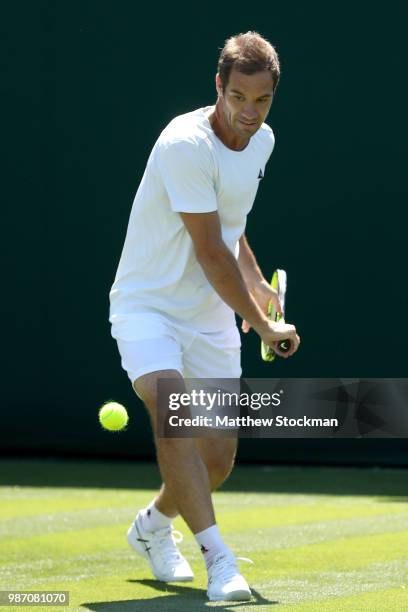 Richard Gasquet of France practices on court during training for the Wimbledon Lawn Tennis Championships at the All England Lawn Tennis and Croquet...